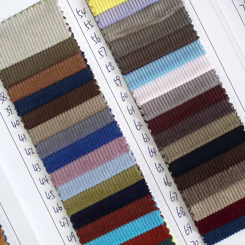 Fabric colour card showing textile swatches in multiple shades